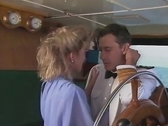 Cand besidesy Evans and besides John Leslie on a boat....