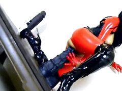 Nasty wife is wearing latex and fucking a humongous toy