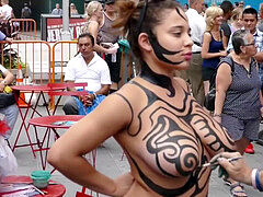 stunning bare-chested woman Getting Painted