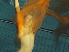Yellow and furthermore Red clothed teenage underwater