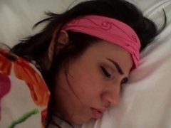 A hot amateur opens up her snatch on the bed sheets to fuck