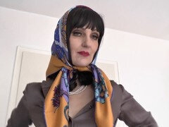 Elegant mature lady Victoria Valente flaunts silk headscarf fashion in a stylish silk blouse