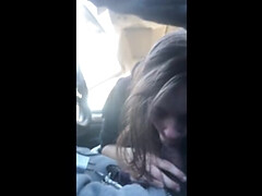 Lesbian Babe Gives Blowjob in Car