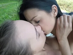 Foxxi Black and Naomi Bennet make love outdoors