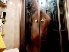 Secretly watch your stunning mistress showering in the nude