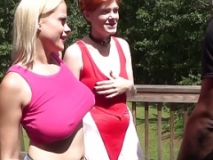 A redhead and plus a blonde give blowjob my flag pole in the backyard