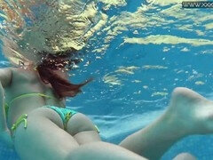 MILF Nicole Pearl flaunting her tight body underwater