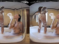 Hot busty lesbian lovers taking a steamy bubble bath in this VR video